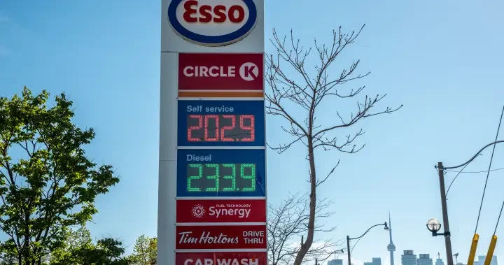 A gas station sign in New Brunswick displays current fuel prices. The federal government has extended its excise tax suspension through January 31, 2027. (CanJam News / Otherwise Credited)