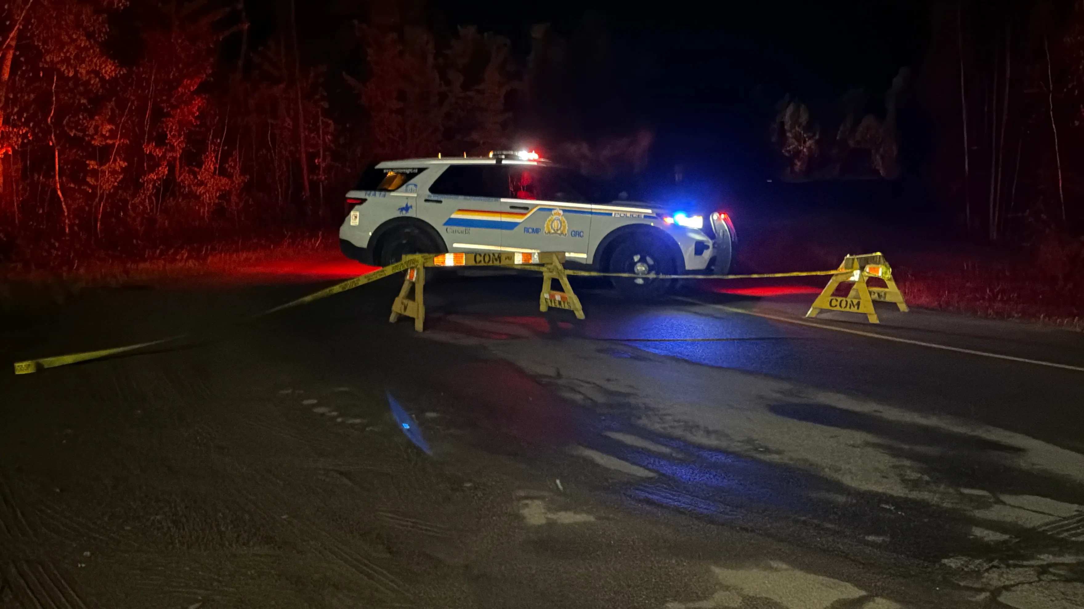 RCMP officers block Berry Mills Road at Zack Road following a fatal two-vehicle collision on October 5, 2026. (Wade Perry / CanJam News)