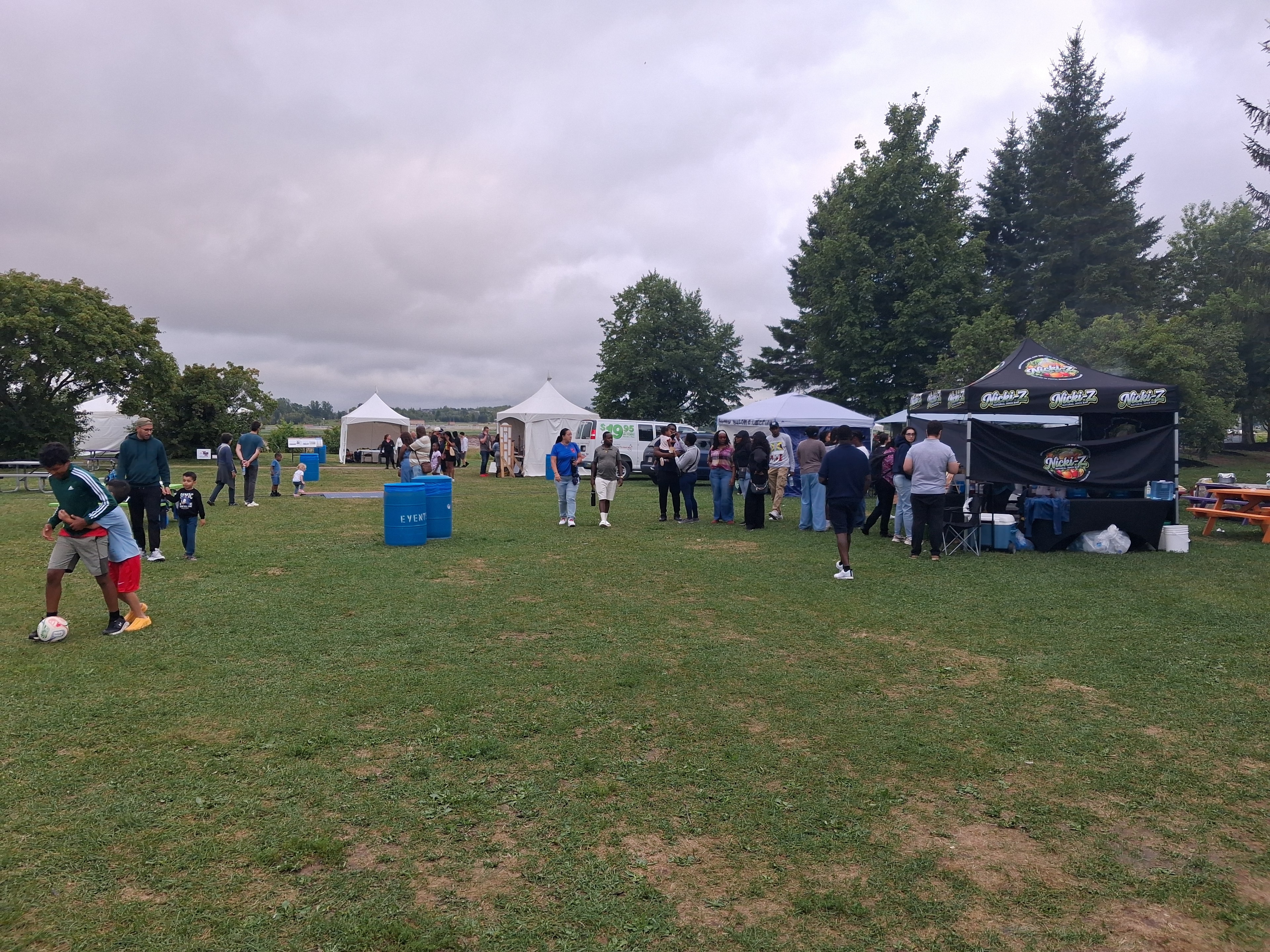 The Jamaican Canadian Association of New Brunswick welcomes visitors to the festival's food-tent area. (Photo: Dwight Simpson/CanJam News)