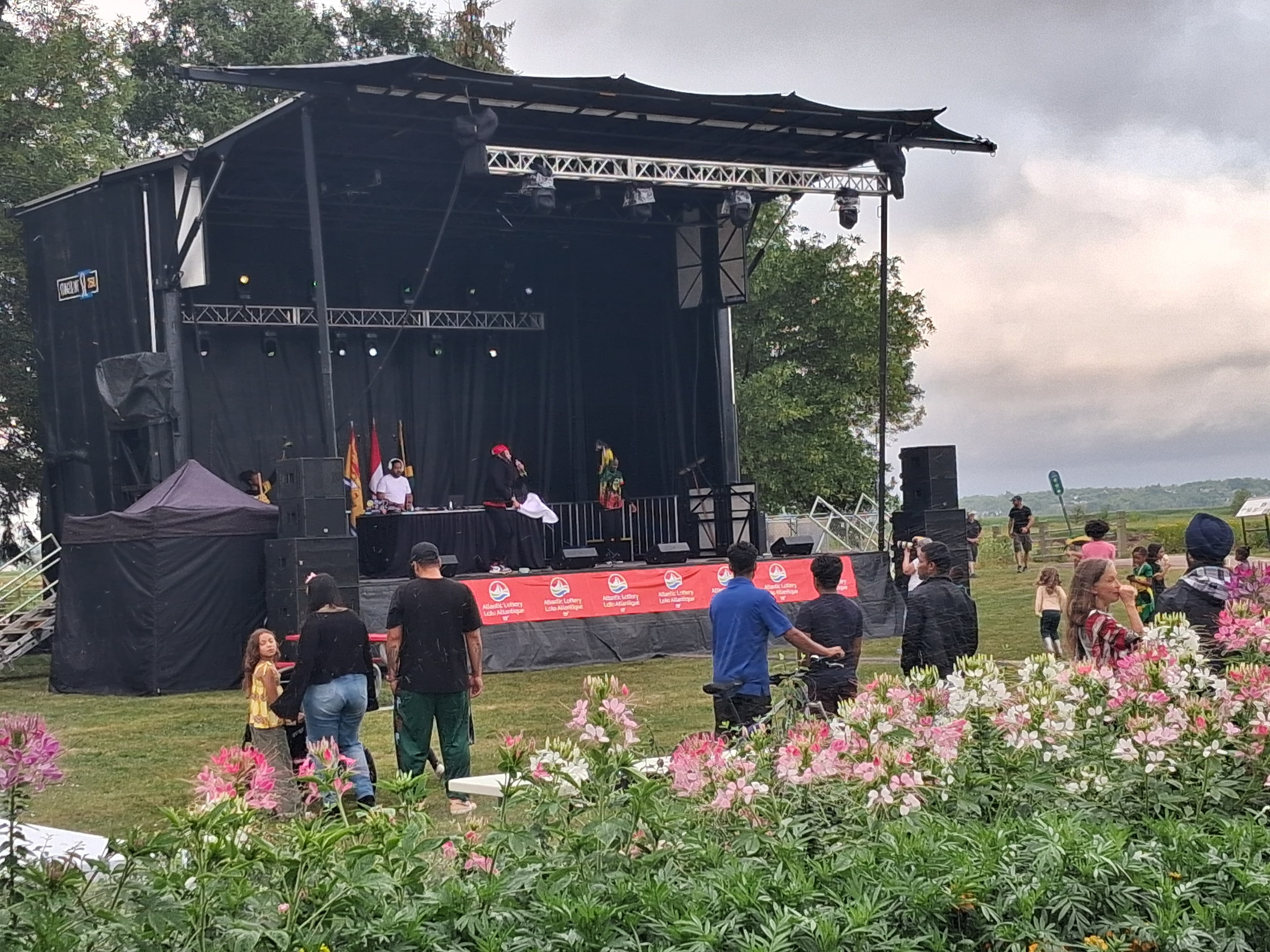 Festivalgoers gather near the entertainment stage at Riverfront Park during Atlantic JerkFlava. (Photo: Dwight Simpson/CanJam News)